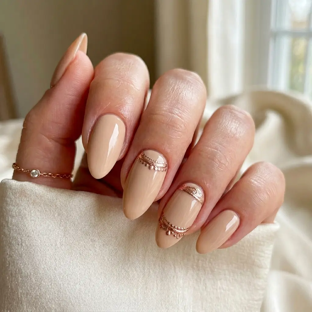 Rose Gold Rings on Warm Cream Almond Nails