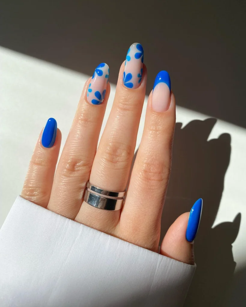 22 Blue Nails Design Ideas You Need to Try for a Chic Manicure 12 Blue Floral Accent Nails