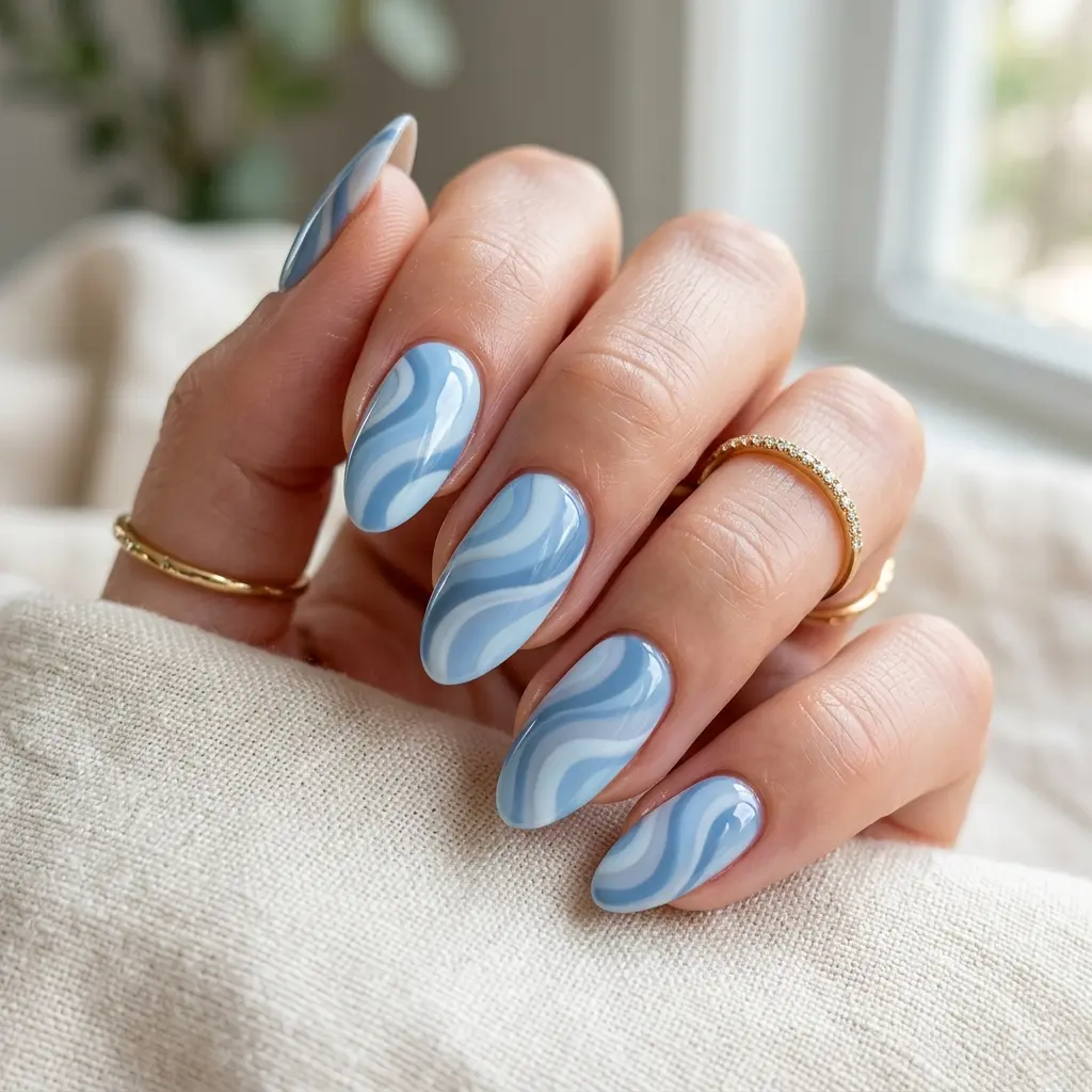 Soft Blue Swirl Nails